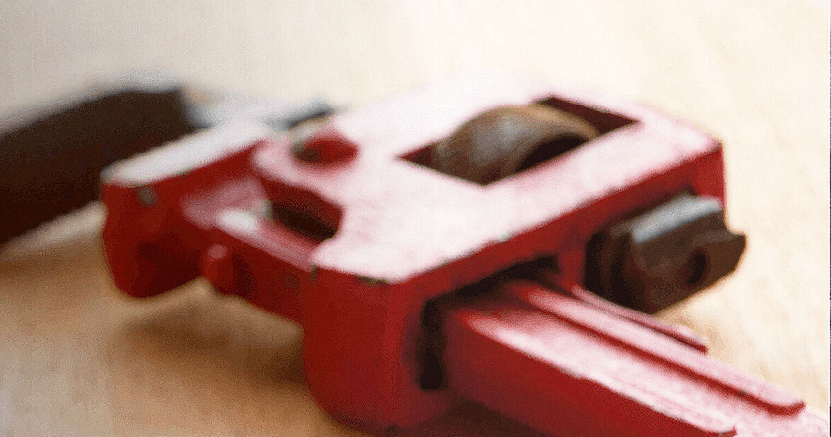 A red pipe wrench